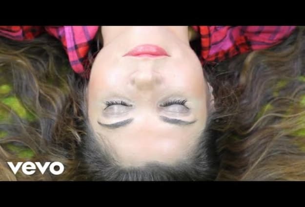 Laura Cheadle in "Everybody Say" music video